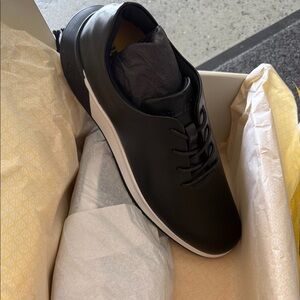 Brand new. In the box and only taken out for pic. Dress shoes for men.
